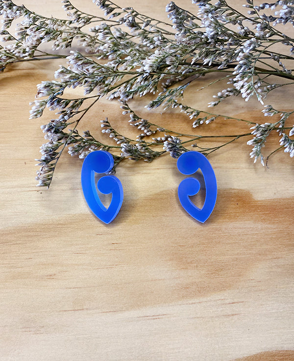 Bright blue stud in a koru shape by Mako Design
