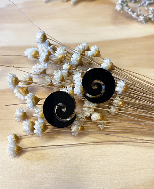 Black koru earring by Mako Design